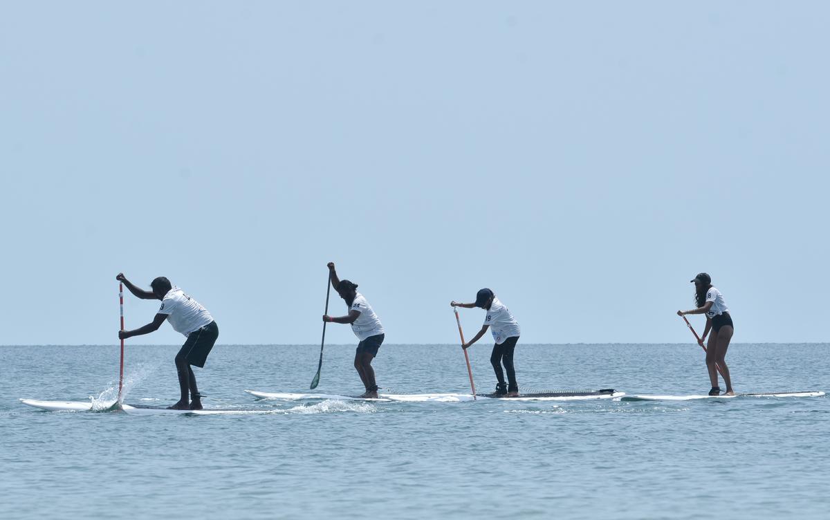 One of the events of National Stand-up Paddling Championship being held off Pirappanvalasai beach near Uchipuli in Ramanathapuram district in 2022.