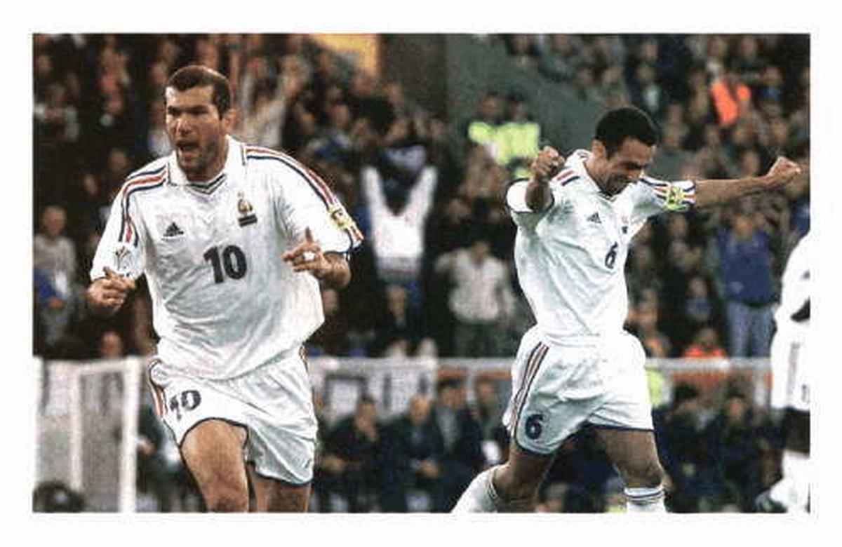 Youri DJorkaeff (right) celebrates a goal during the Euro 2000 quarterfinal.