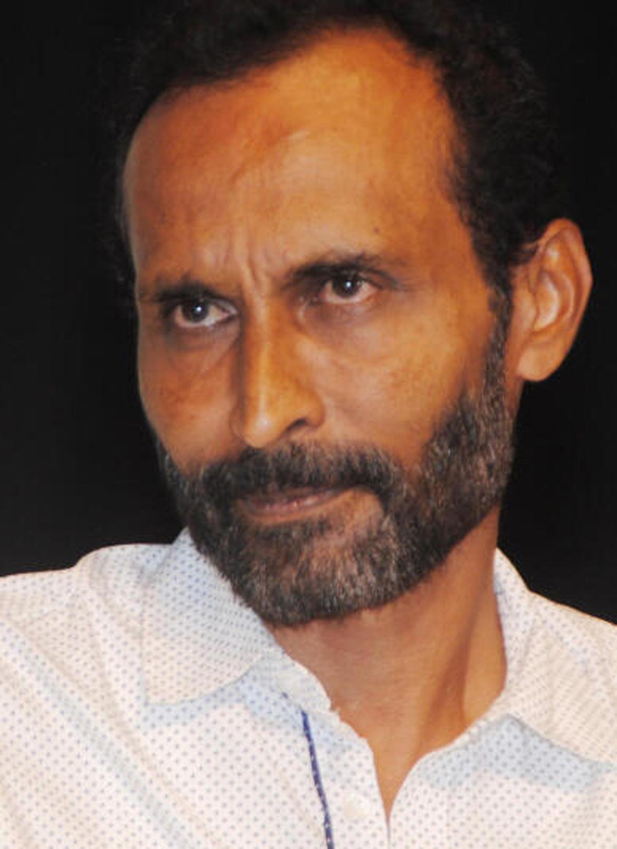 Tulu film Director, Vijaykumar Kodialbail. Tulu film Director, Vijaykumar Kodialbail.