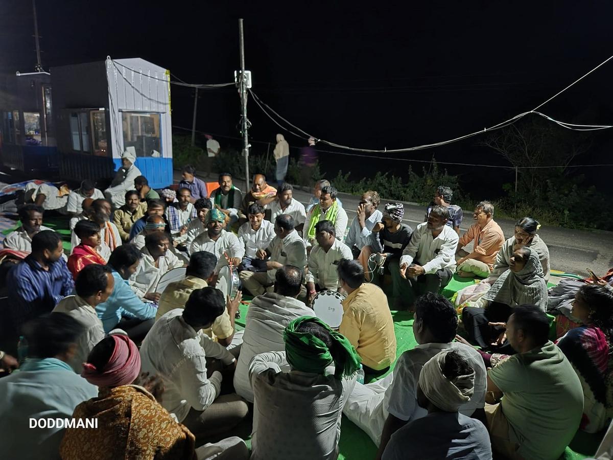 Supporters of Janata Dal(S) MLA Karemma G. Nayak participating in the overnight dharna at Kakargal toll gate in Deodurg taluk. 