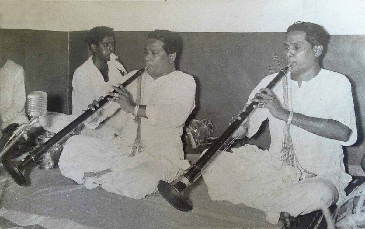 Karukurichi P Arunachalam (left) with K M Arunachalam. 