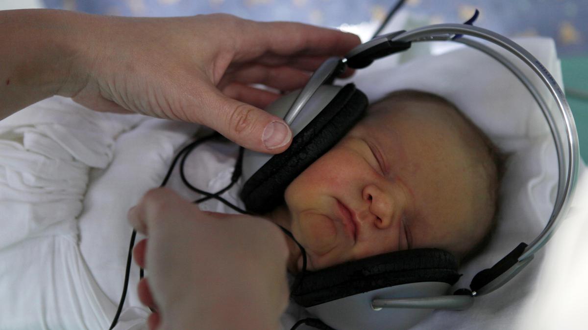 Why happy rather than sad music soothes newborns