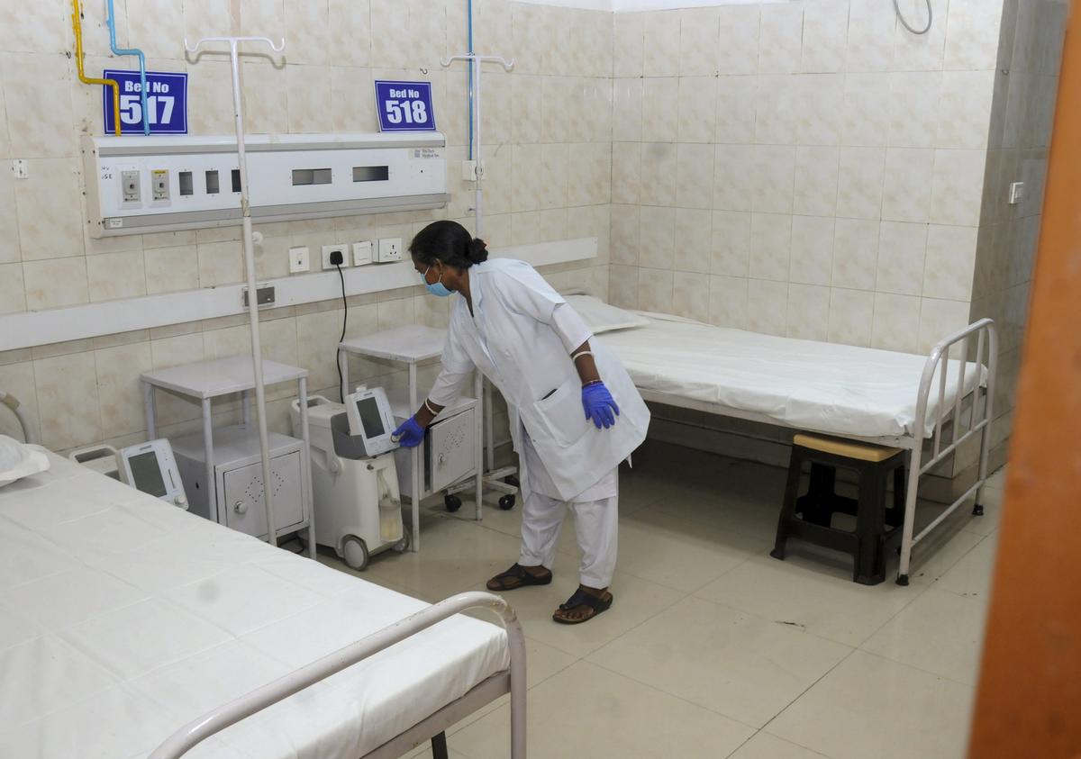 A nurse prepares a ward for COVID-19 patients at a hospital in Ranchi A nurse prepares a ward for COVID-19 patients at a hospital in Ranchi