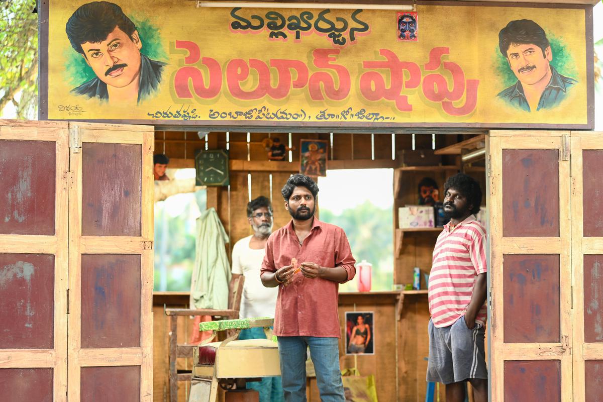 Suhas (centre), Jagadeesh and others in a scene from ‘Ambajipeta Marriage Band’.