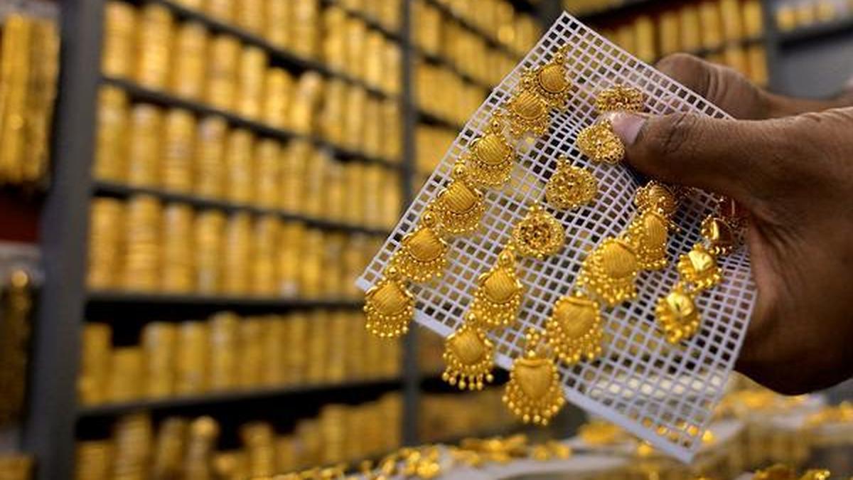 Strong dollar pounds gold, silver