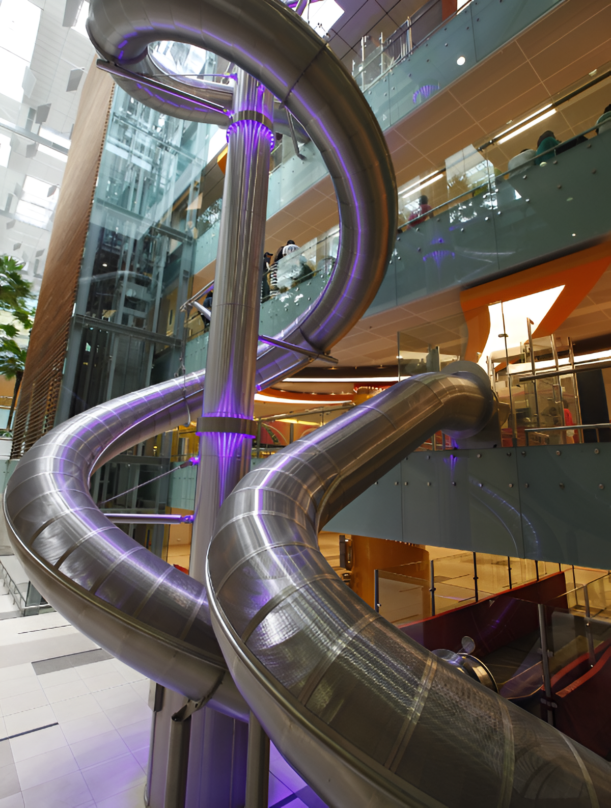 Singapore’s tallest slide and the world’s tallest slide in an airport. At 12m tall (or four storeys high), The Slide@T3 at Changi Airport goes from Level 1 and take ride down to Basement 3 Singapore’s tallest slide and the world’s tallest slide in an airport. At 12m tall (or four storeys high), The Slide@T3 at Changi Airport goes from Level 1 and take ride down to Basement 3