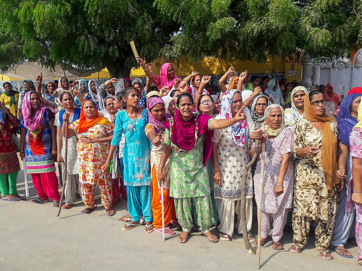 Followers of Gurmeet Ram Rahim Singh gather in his support ahead of a court’s verdict in a rape case. The self-styled religious leader has been convicted of raping two of his women disciples.