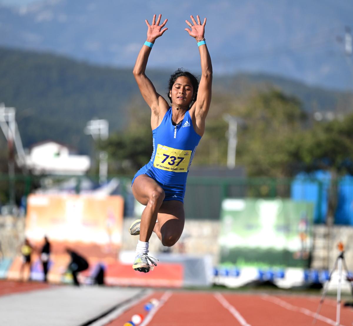 Minutes after taking the women’s 100m hurdles silver, West Bengal’s Moumita Mondal went on to win the long  jump gold at the 38th National Games in Dehradun on Sunday, 09 February 2025. 