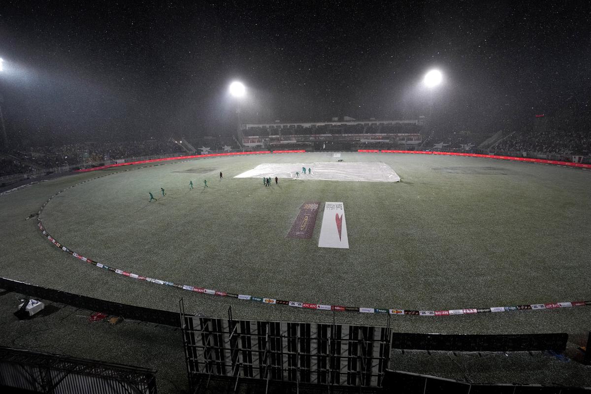 Ground staff cover the pitch after heavy hailstones rain stop the play of fourth Twenty20 cricket match between Pakistan and New Zealand, in Rawalpindi, Pakistan on April 20, 2023. Ground staff cover the pitch after heavy hailstones rain stop the play of fourth Twenty20 cricket match between Pakistan and New Zealand, in Rawalpindi, Pakistan on April 20, 2023.
