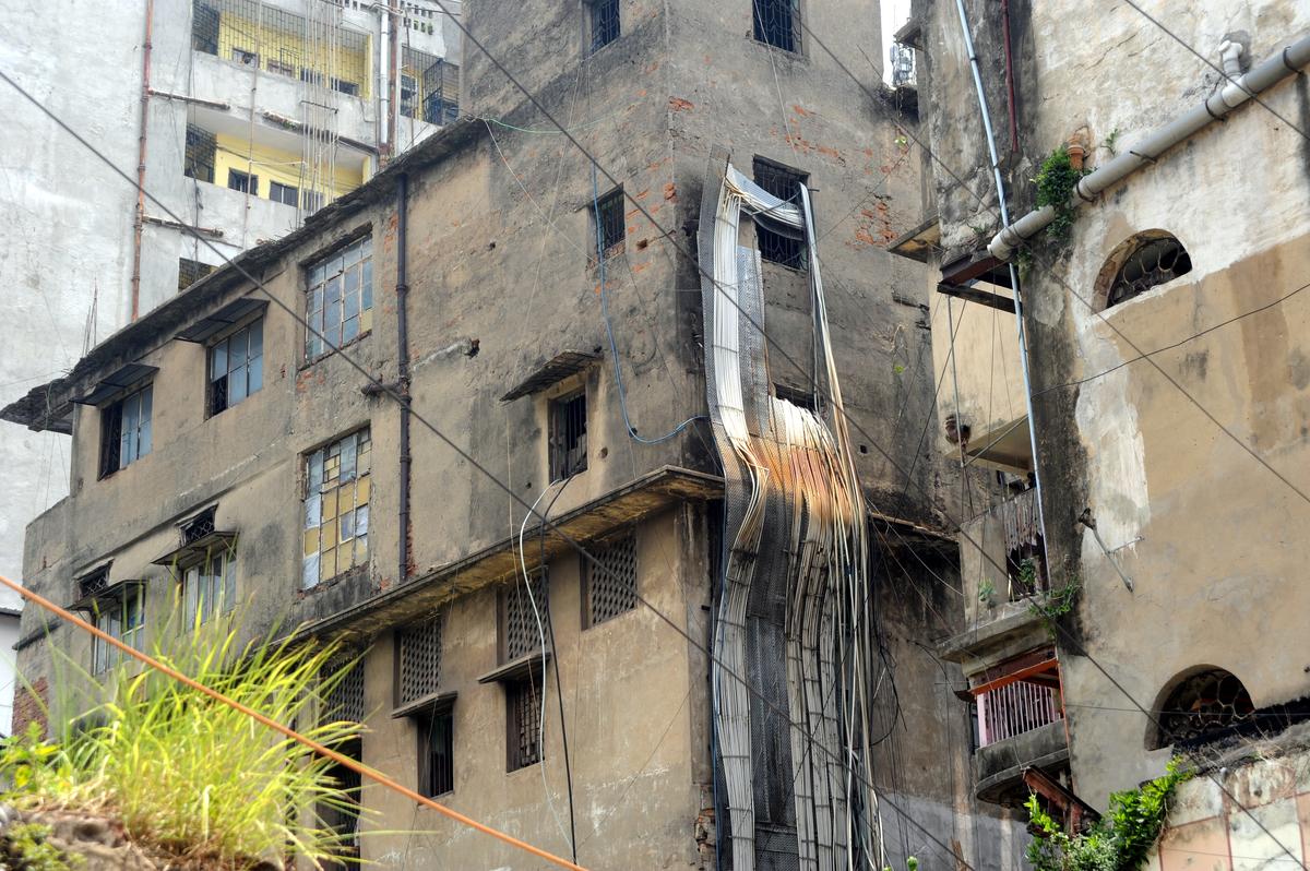 Electrical wires hanging out of a building at Rabindra Sarani, Terreti Bazaar. This is one of the many such buildings in the area which follow no fire safety protocols.  