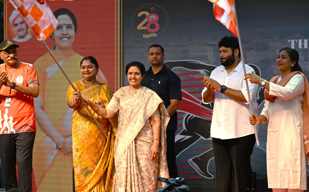 Managing Trustee of NTR Trust Nara Bhuvaneswari flagging off the Thalassemia Run, along with former Indian Weightlifter, Karanam Malleswari, at the RK Beach in Visakhapatnam on Saturday. Music director SS Thaman and Home Minister V. Anitha are seen. 