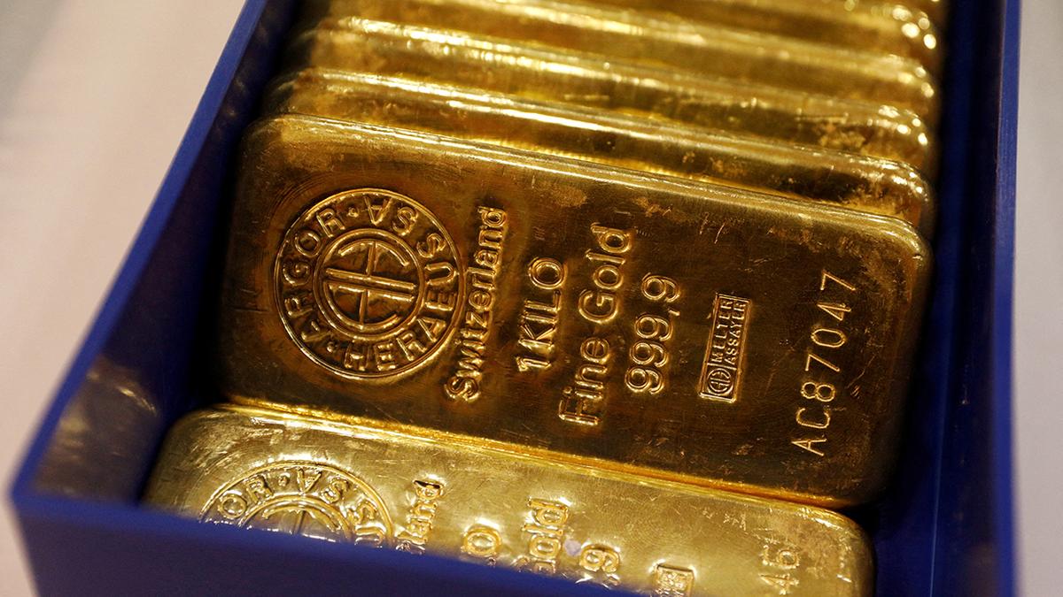 Gold steady after hitting record high on U.S. rate outlook, Mideast concerns