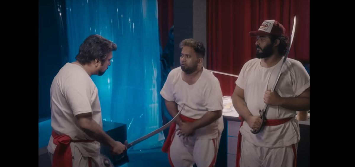 KB Ganesh Kumar, Aju Varghese and Gokul Suresh in a scene from Gaganachari