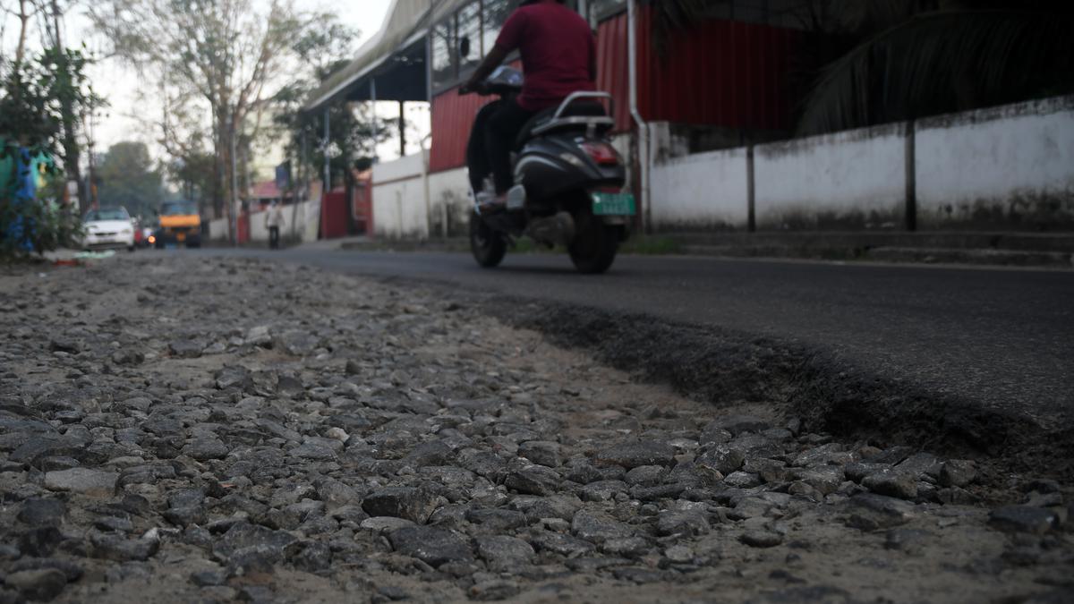 Motorists, pedestrians have a harrowing time negotiating busy but potholed byroads in Kochi