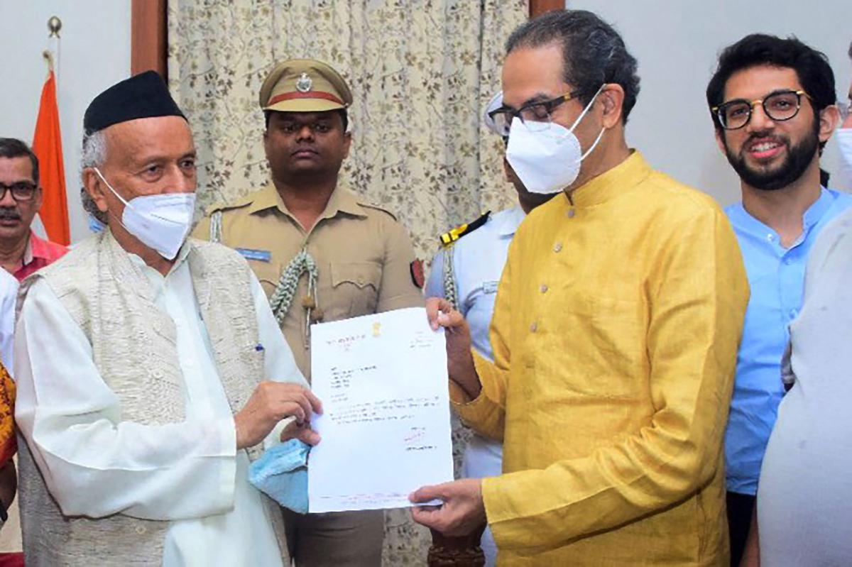 Governor of Maharashtra Bhagat Singh Koshiyari (left) receives the resignation letter of Chief Minister Uddhav Thackeray at Raj Bhavan in Mumbai on June 29. 