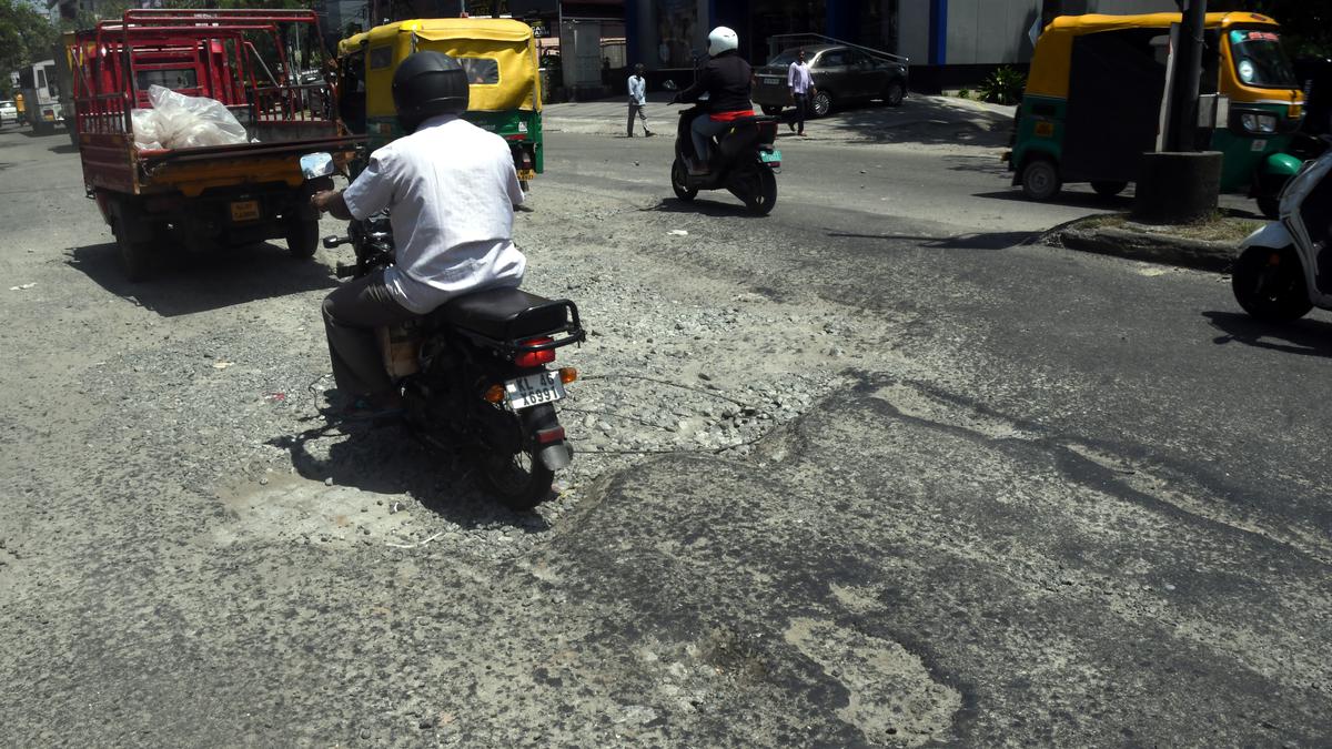 Potholed roads in Kochi give commuters, pedestrians a harrowing time