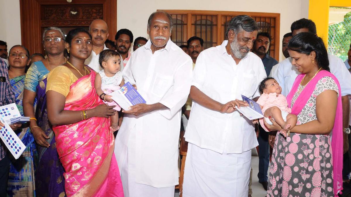 Chief Minister hands over receipts of fixed deposit for ₹50,000 to parents of girl children