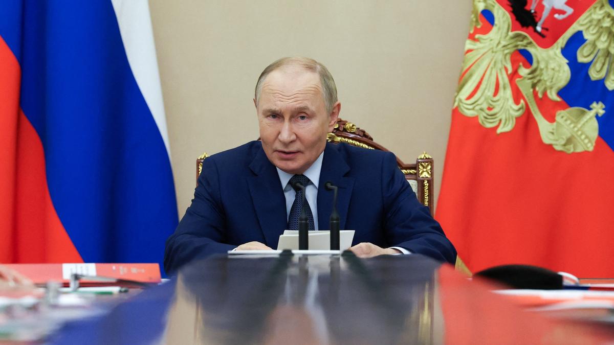 Putin says Russia will stick to nuclear arms limits for one more year