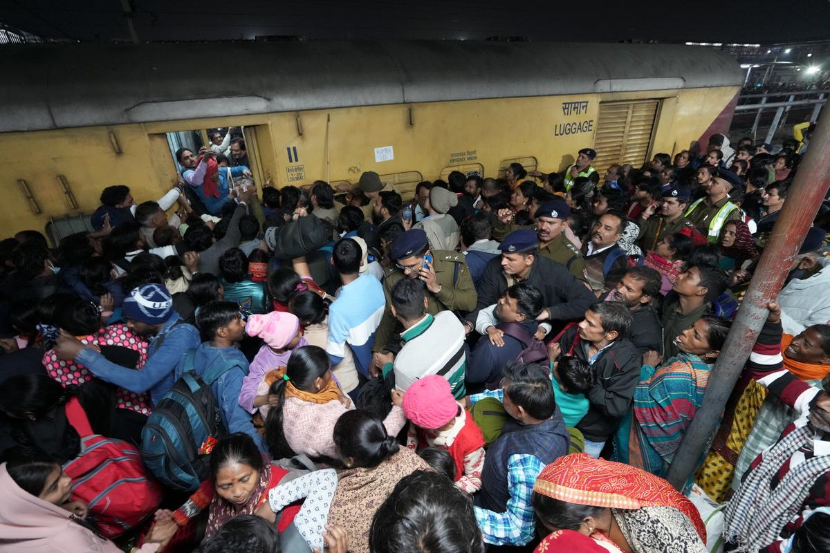 Heavy rush of passengers to catch a train for Mahakumbh, at the New Delhi railway station. A stampede occured on February 15. Heavy rush of passengers to catch a train for Mahakumbh, at the New Delhi railway station. A stampede occured on February 15.