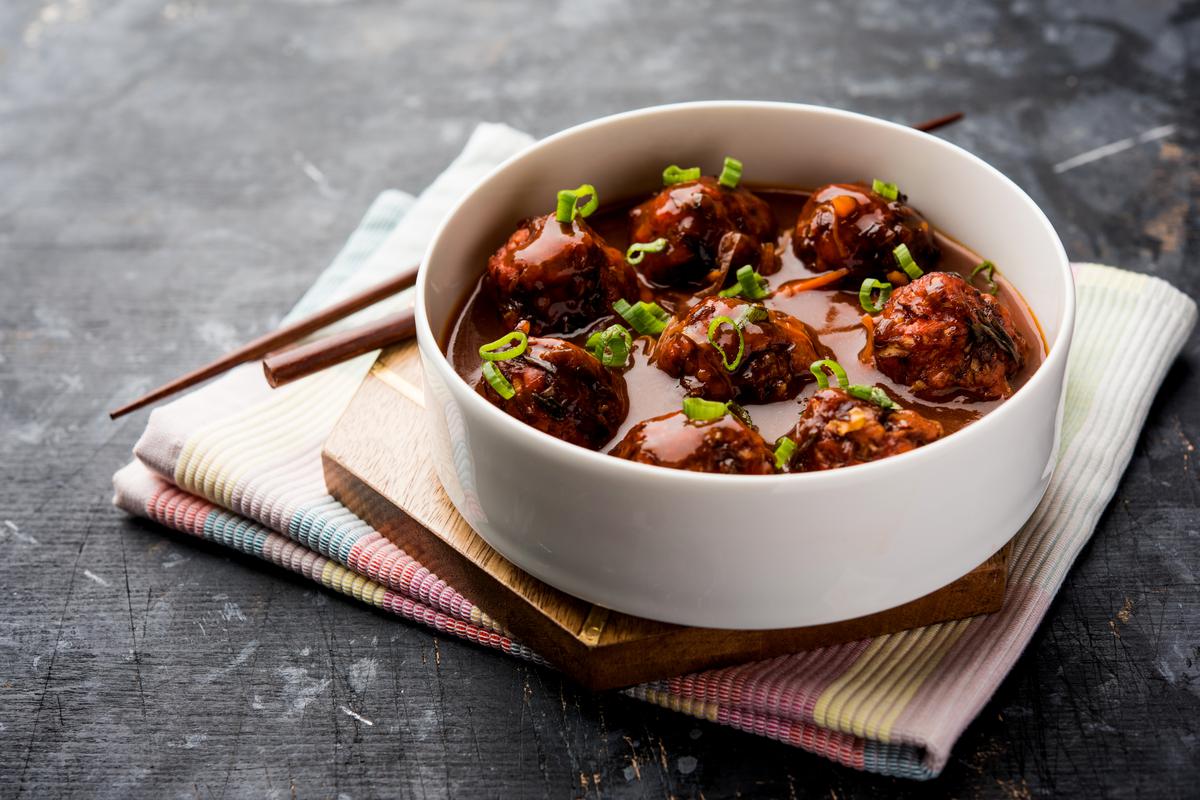 Veg Manchurian with gravy - Popular food of India made of cauliflower florets and other vegetable Indo-Chinese dish Gobi Manchurian. ISTOCK image