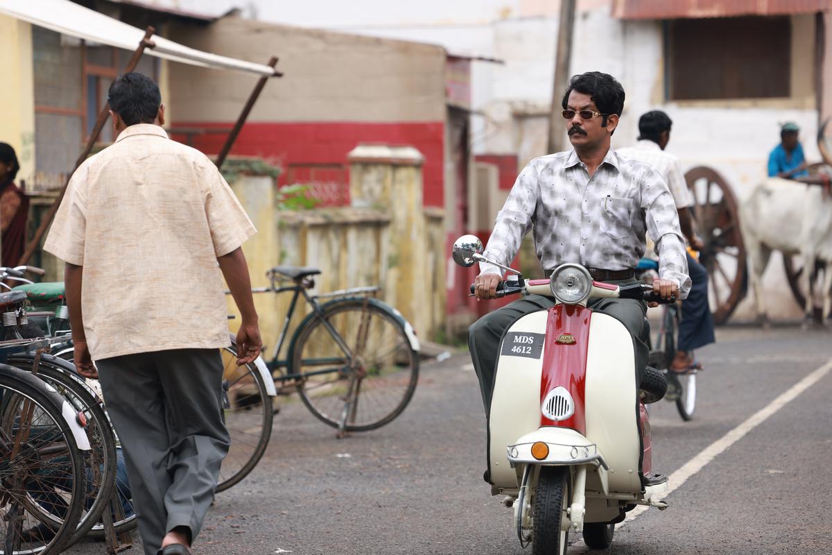 Ravindra Vijay in Tamil film Raghu Thatha. 