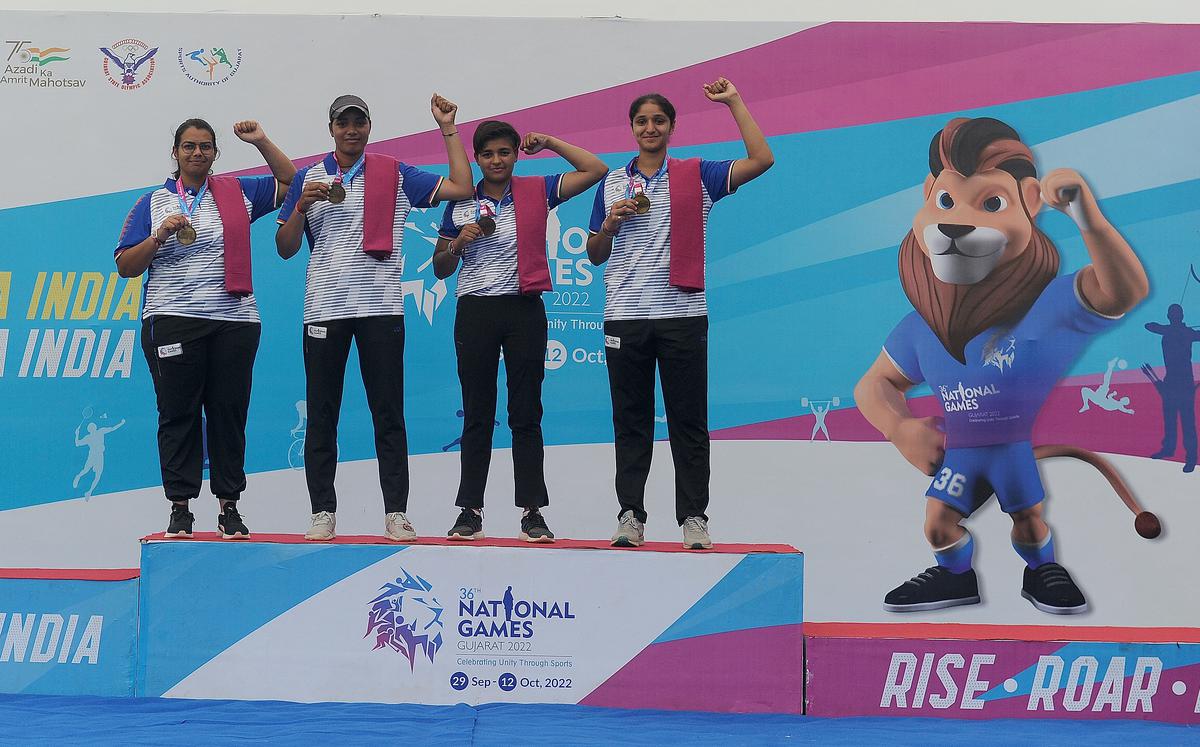 Bhajan Kaur, Preeti, Sangeeta and Avani of Haryana after winning the women’s team recurve gold at the 36th National Games Gujarat 2022 in Ahmedabad on Thursday, October 6, 2022.  