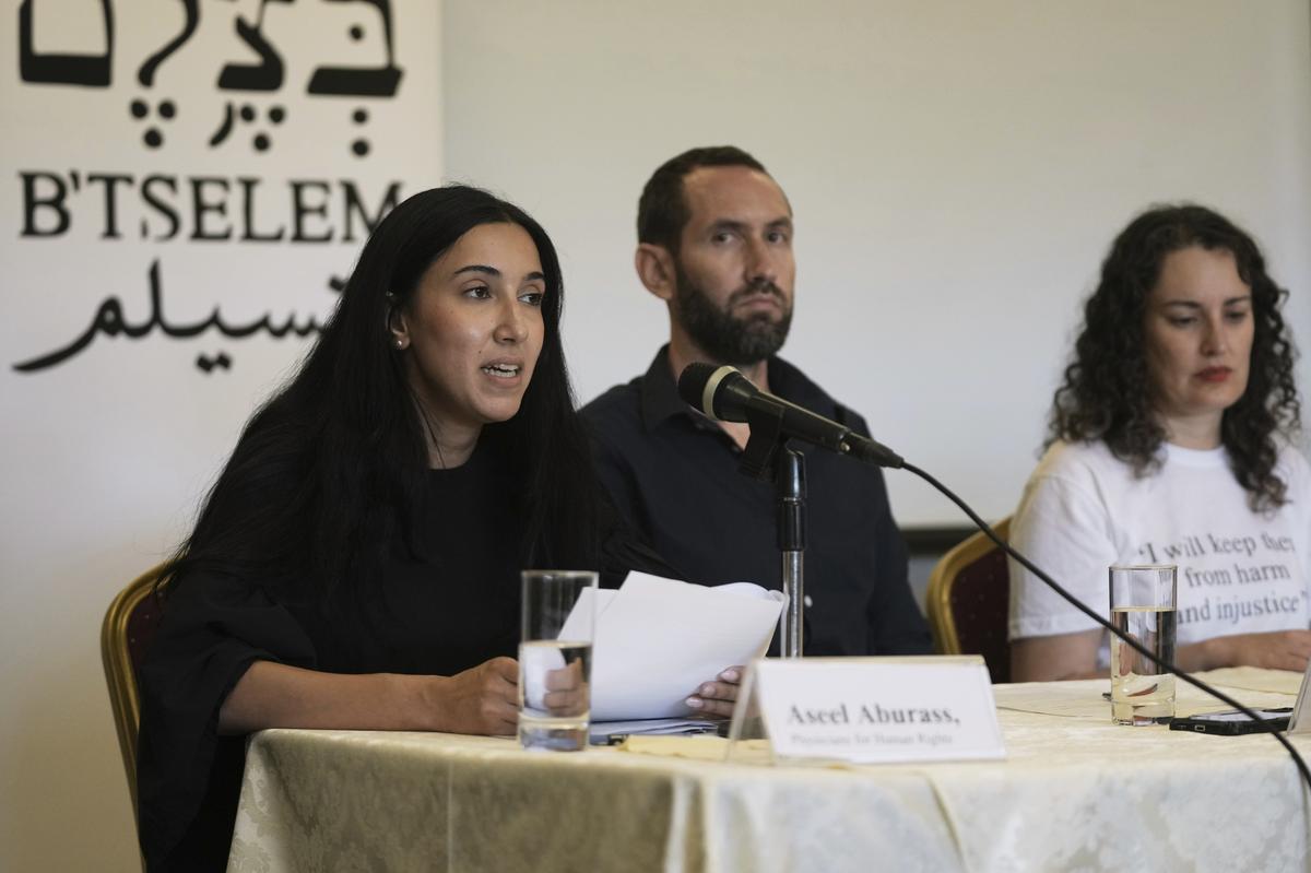 Aseel Aburass, left, of PHRI (Physicians for human Rights Israel) speaks at a press conference with B’Tselem, the Israeli Information Center for Human Rights in the Occupied Territories, releasing a report, “Our Genocide,” calling the war in Gaza a genocide, and PHRI’s legal-medical analysis of the systematic destruction of Gaza’s healthcare system, in Jerusalem, Monday, July 28, 2025. Aseel Aburass, left, of PHRI (Physicians for human Rights Israel) speaks at a press conference with B’Tselem, the Israeli Information Center for Human Rights in the Occupied Territories, releasing a report, “Our Genocide,” calling the war in Gaza a genocide, and PHRI’s legal-medical analysis of the systematic destruction of Gaza’s healthcare system, in Jerusalem, Monday, July 28, 2025.