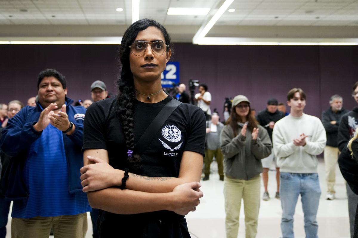 Eep Bolaño listens as IAM District 751 president Jon Holden announces that the union voted to accept a new contract offer from Boeing, at their union Hall in Seattle on November 4, 2024.