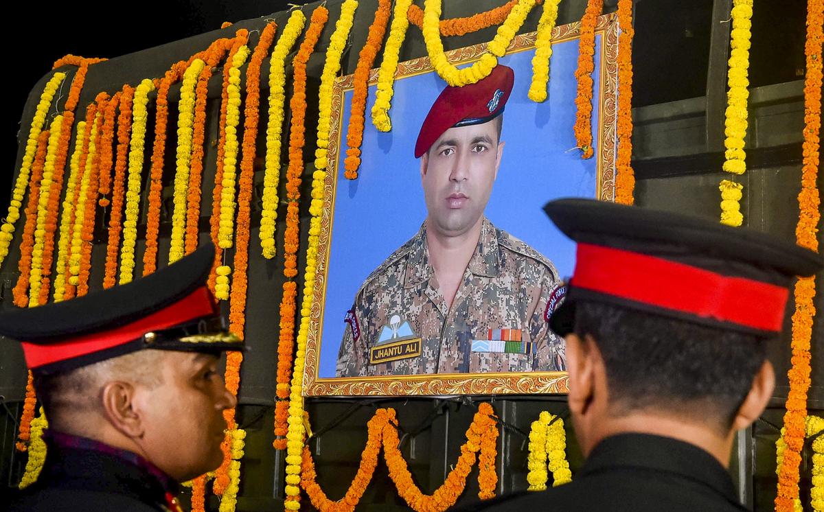 Army persoonel wait for arrival of the mortal remains of paratrooper Jhantu Ali Sheikh, who was killed in the Pahalgam terrorist attack, at the NSCBI Airport, in Kolkata, Friday night, April 25, 2025. Army persoonel wait for arrival of the mortal remains of paratrooper Jhantu Ali Sheikh, who was killed in the Pahalgam terrorist attack, at the NSCBI Airport, in Kolkata, Friday night, April 25, 2025.