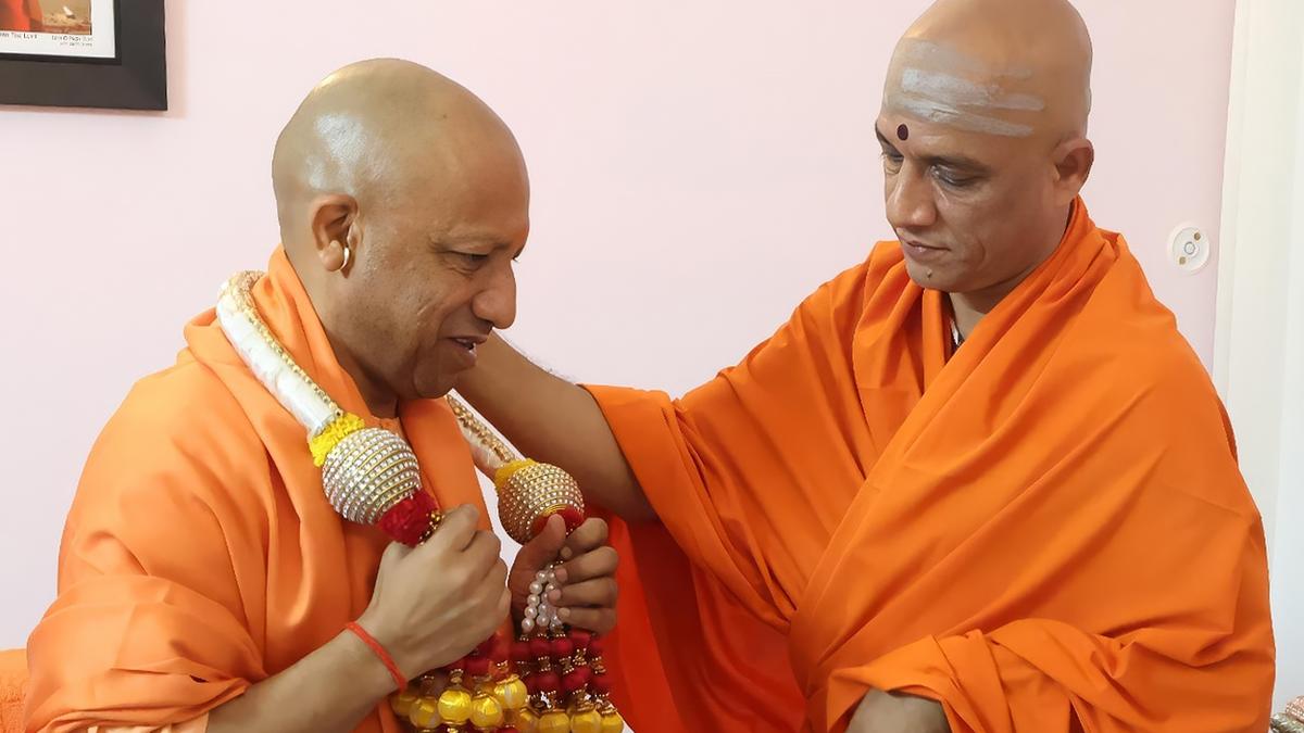 U.P. CM calls on Nirmalanandanatha Swamiji