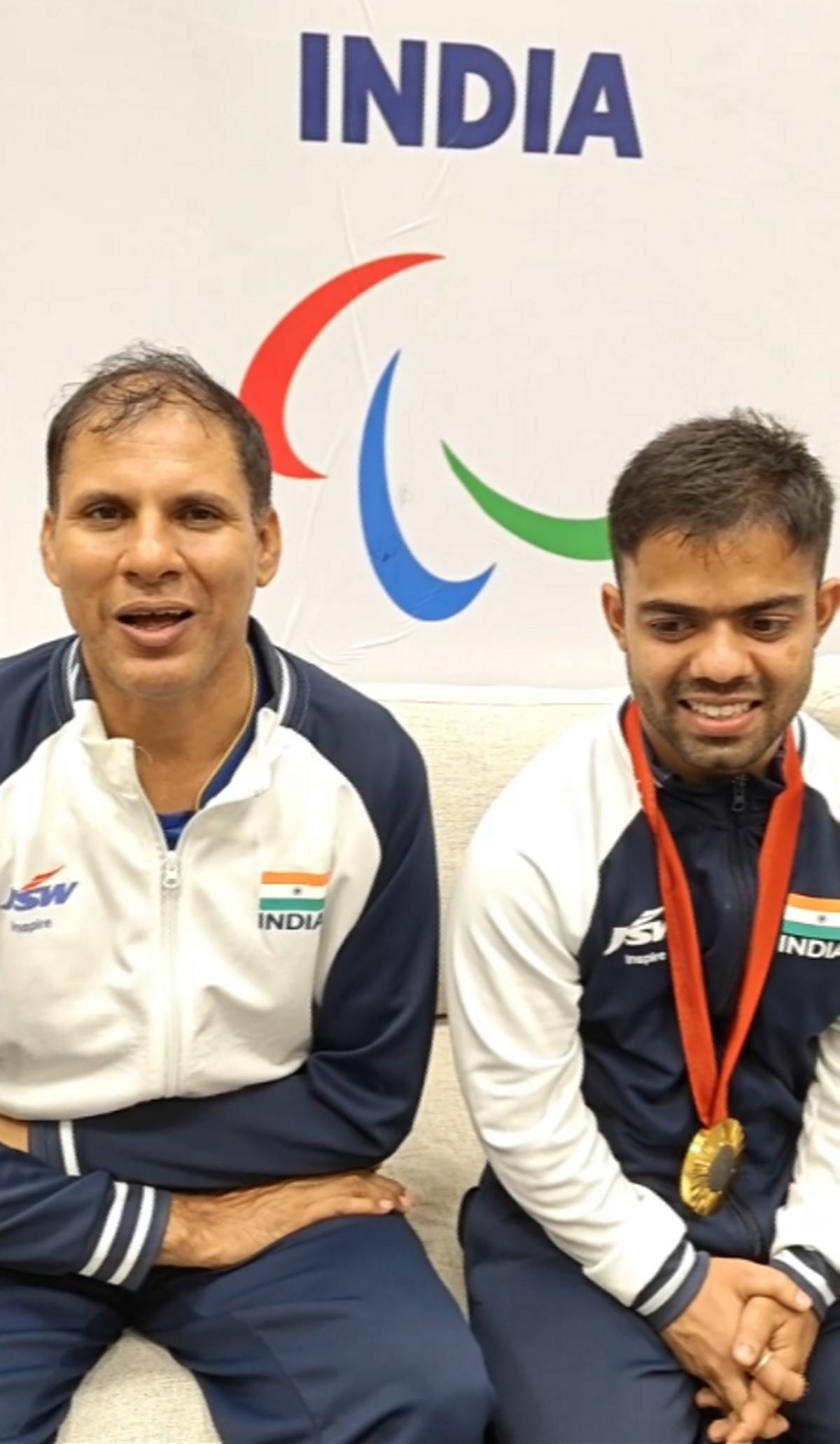 **EDS: SCREENSHOT VIA PTI VIDEOS** Paris: PCI President Devendra Jhajharia with gold-medalist para-javelin thrower Navdeep Singh, at Paris Paralympics. (PTI Photo) (PTI09_08_2024_000034B)