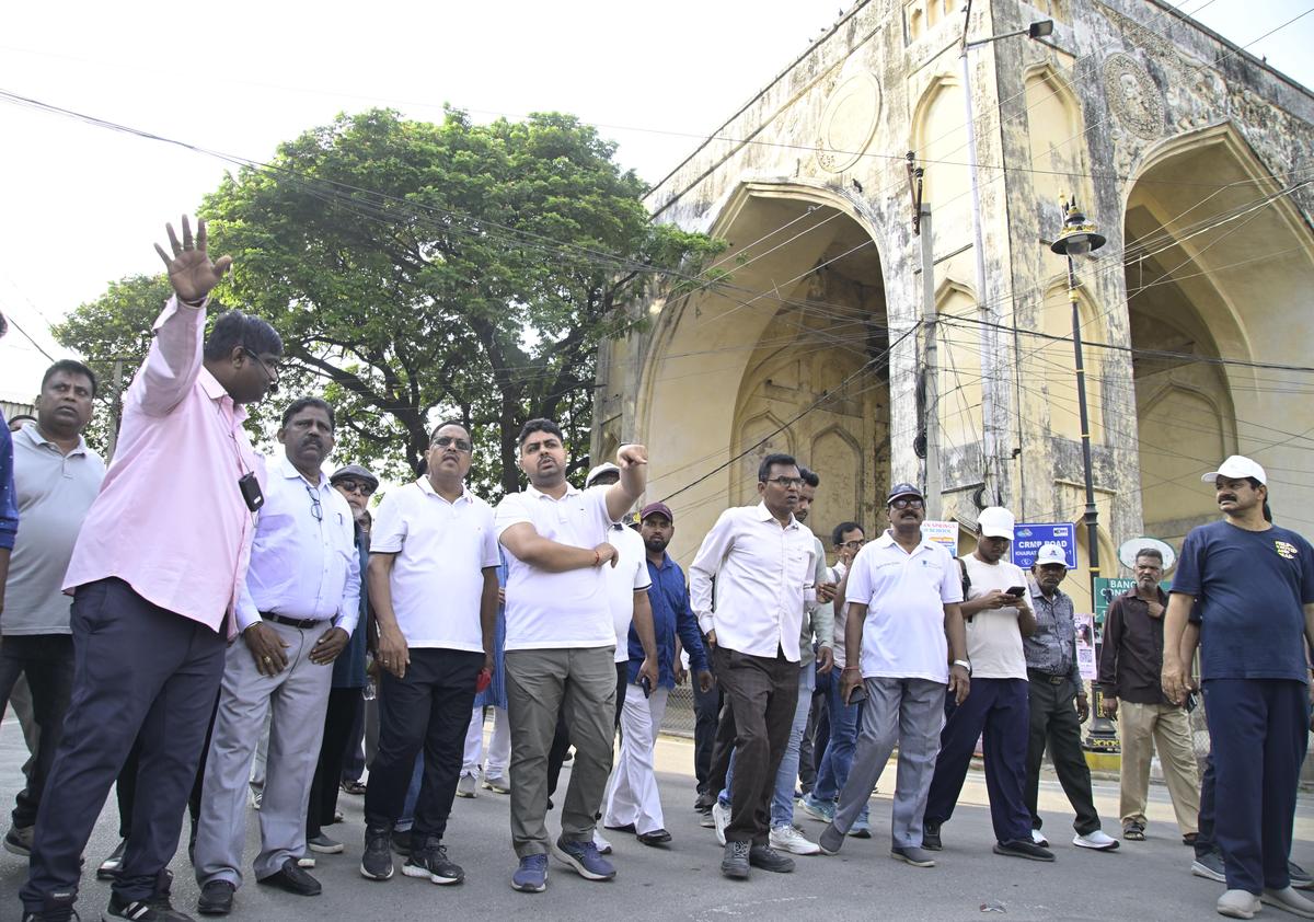 Heritage enthusiasts at the Khazana Building, a single-storey Qutb Shahi structure located near Golconda Fort in Hyderabad.