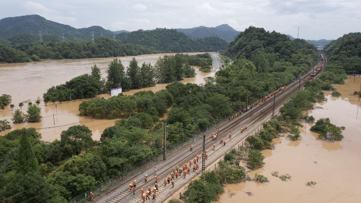 South China floods force tens of thousands to evacuate