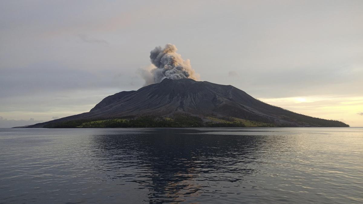 More than 2,100 people are evacuated as an Indonesian volcano spews clouds of ash