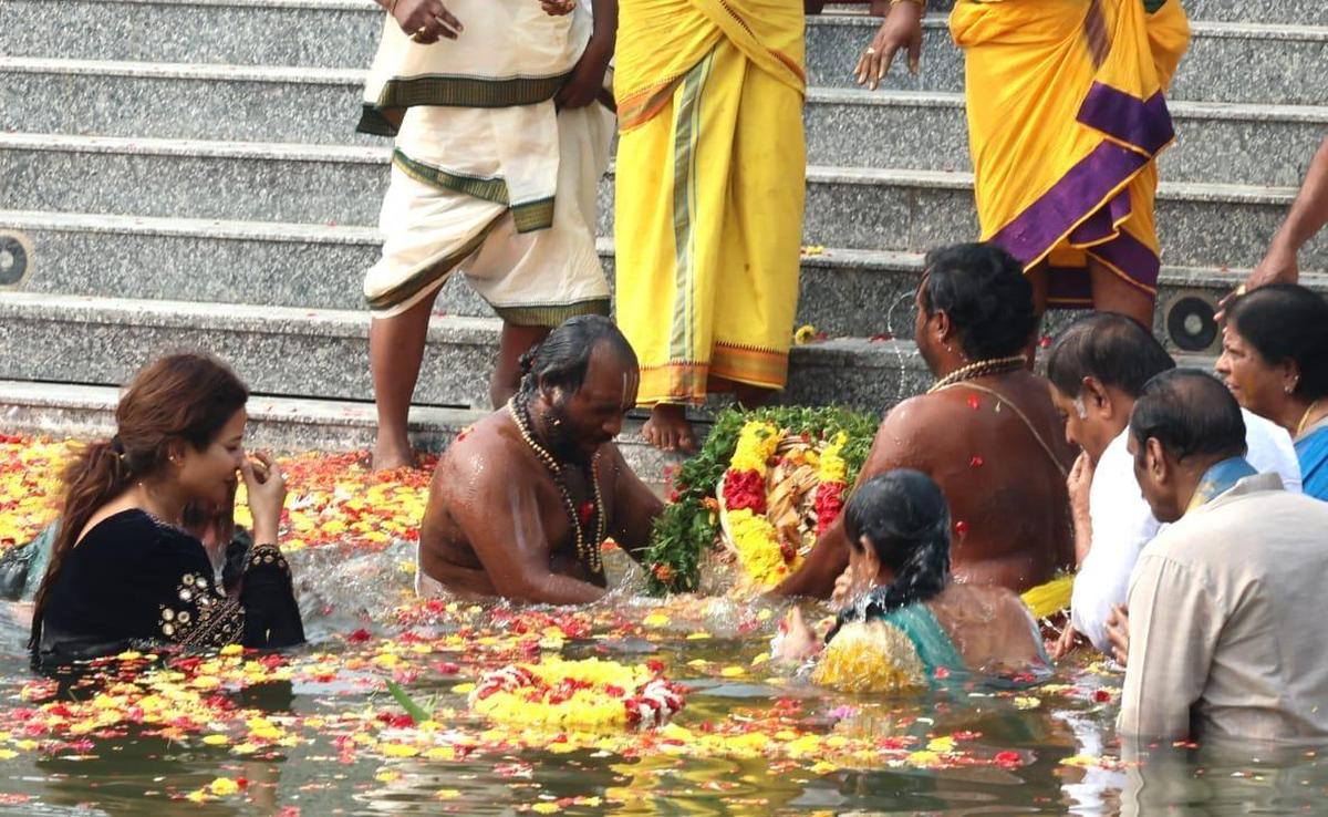 Priests performing the sacred Chakra Snanam at Dokiparru Mahakshetram on Friday.