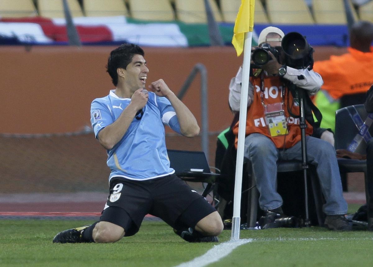 File picture of Luis Suarez celebrating a goal for Uruguay during the 2010 World Cup match against Mexico in Rustenburg, South Africa