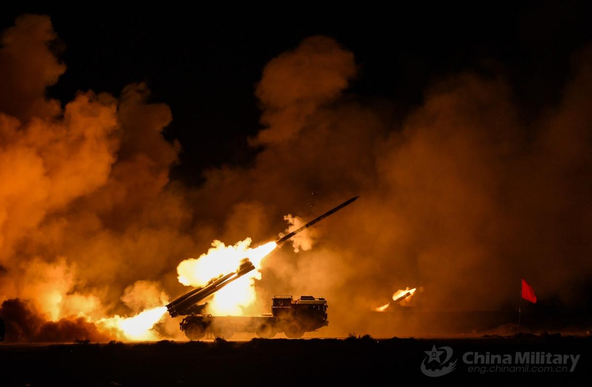 PHL-03 long-range multiple launch rocket systems attached to an artillery battery under the PLA 74th Group Army fires rockets at simulate target during a night raid exercise in an undisclosed desert area of northwest China on August 18, 2019. (eng.chinamil.com.cn/Photo by Huang Hai) PHL-03 long-range multiple launch rocket systems attached to an artillery battery under the PLA 74th Group Army fires rockets at simulate target during a night raid exercise in an undisclosed desert area of northwest China on August 18, 2019. (eng.chinamil.com.cn/Photo by Huang Hai)