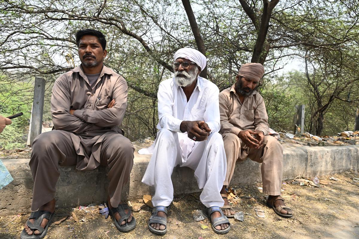  Hari Dass (left) from the Majnu Ka Tila camp.