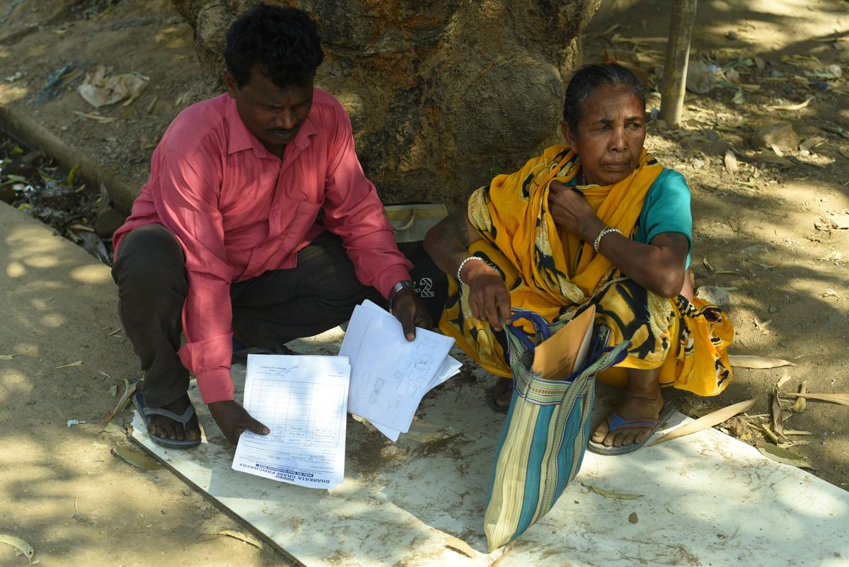 Villagers seen with proof of ownership of their village land.
