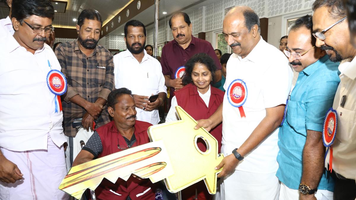 Finance Minister hands over keys to homes built for lottery agents and sellers