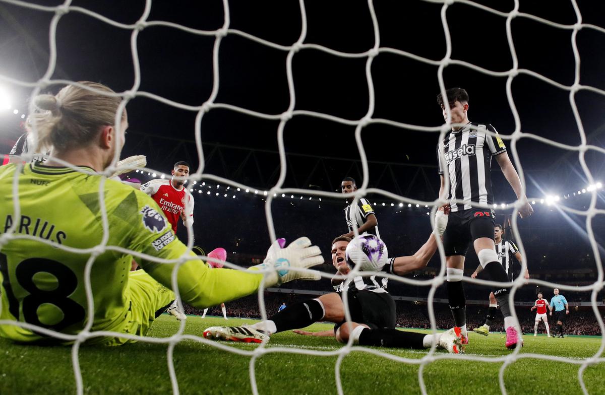 Newcastle United’s Sven Botman scores an own goal against Arsenal