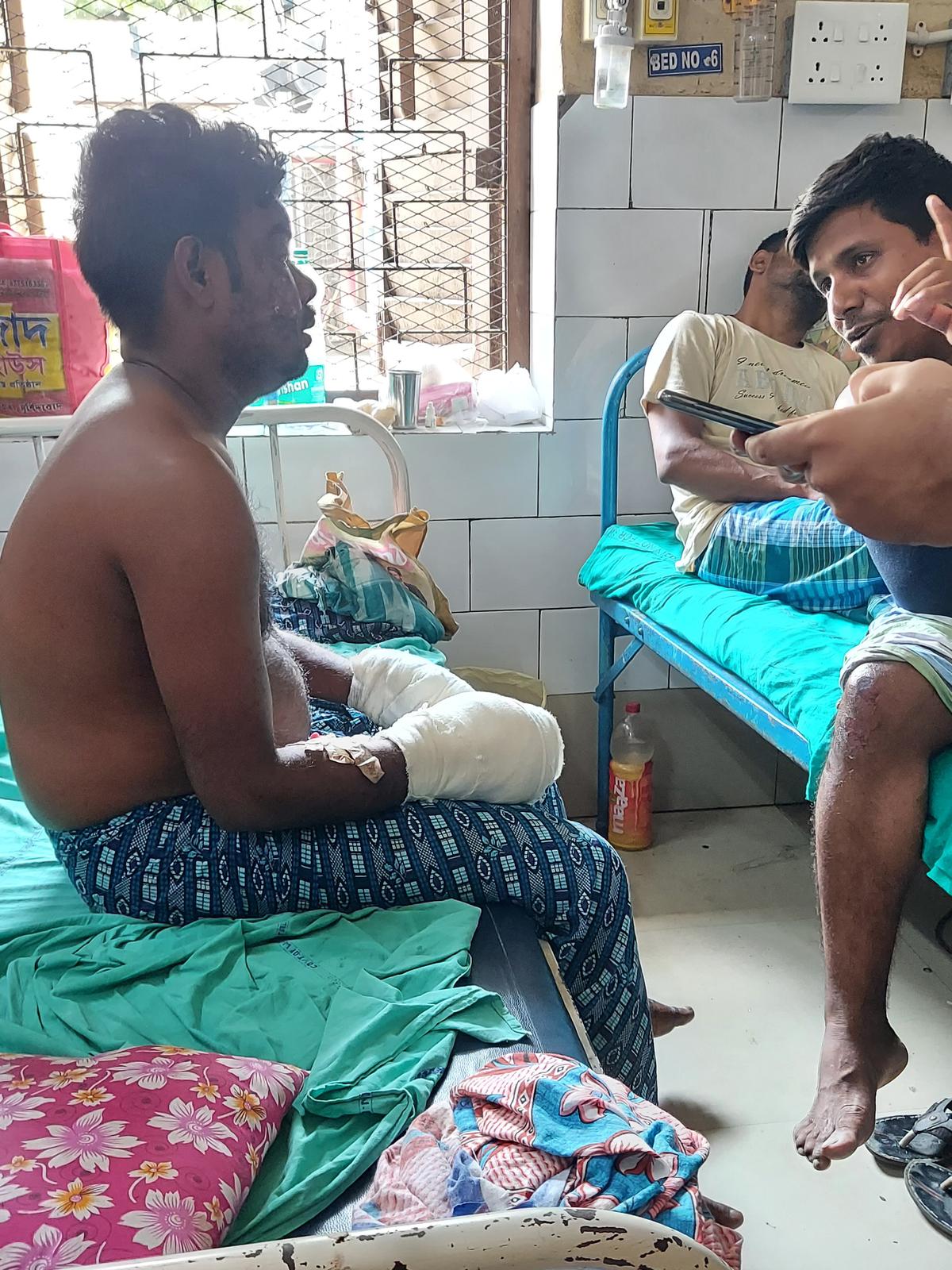 Abdul Lateef, from Farraka, at Murshidabad Medical College and Hospital. Lateef sustained injuries on his face and hands in a crude bomb explosion.