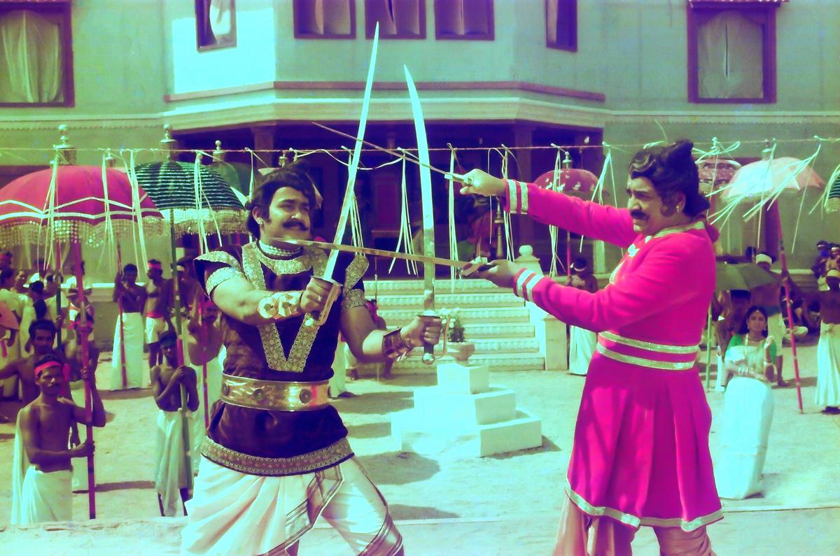 Still from Priyadarsan’s Kadathanadan Ambadi (1990) featuring Mohanlal and Prem Nazir.