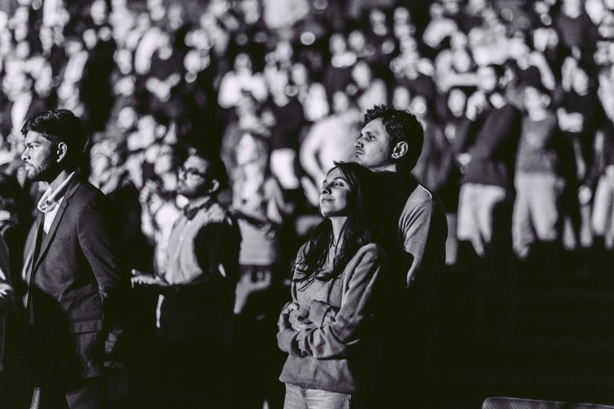 The crowd at the Bharat Mandapam watches on as Jon Batiste performs in New Delhi on November 24, 2025