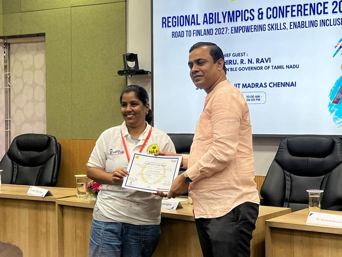 Swetha Kulkarni receives the certificate at the Regional Abilympics meet Swetha Kulkarni receives the certificate at the Regional Abilympics meet
