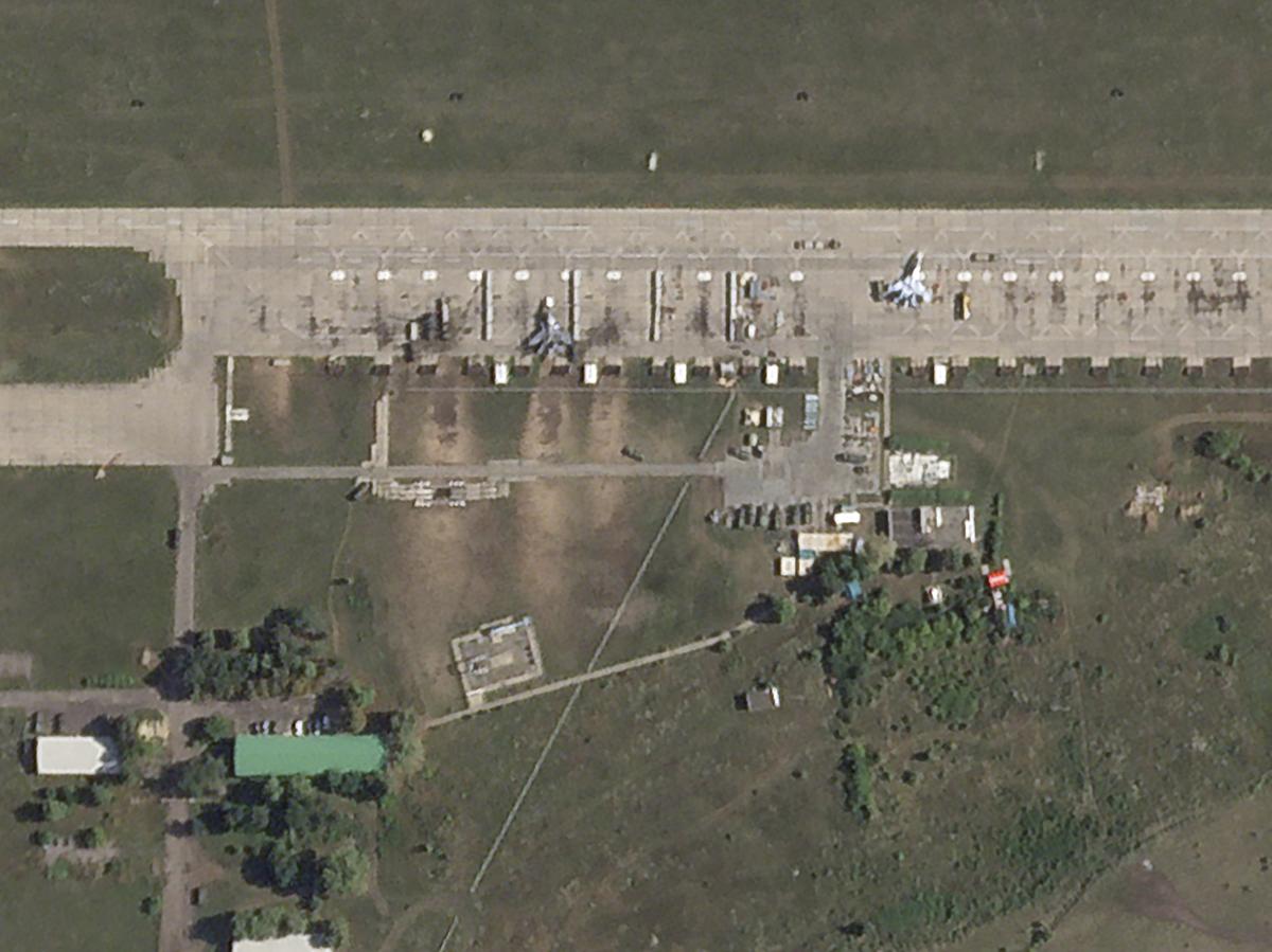 This satellite photo from Planet Labs PBC shows damaged fighter jets at the Borisoglebsk Air Base in Russia after an attack by Ukrainian drones on Wednesday, Aug. 14, 2024.