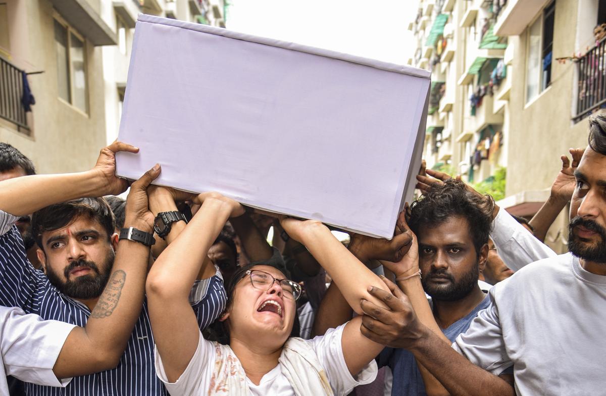 Sister of Lawrence Daniel Christian, who was killed in the Air India plane crash, mourns at his residence, in Ahmedabad on June 22, 2025. Sister of Lawrence Daniel Christian, who was killed in the Air India plane crash, mourns at his residence, in Ahmedabad on June 22, 2025.