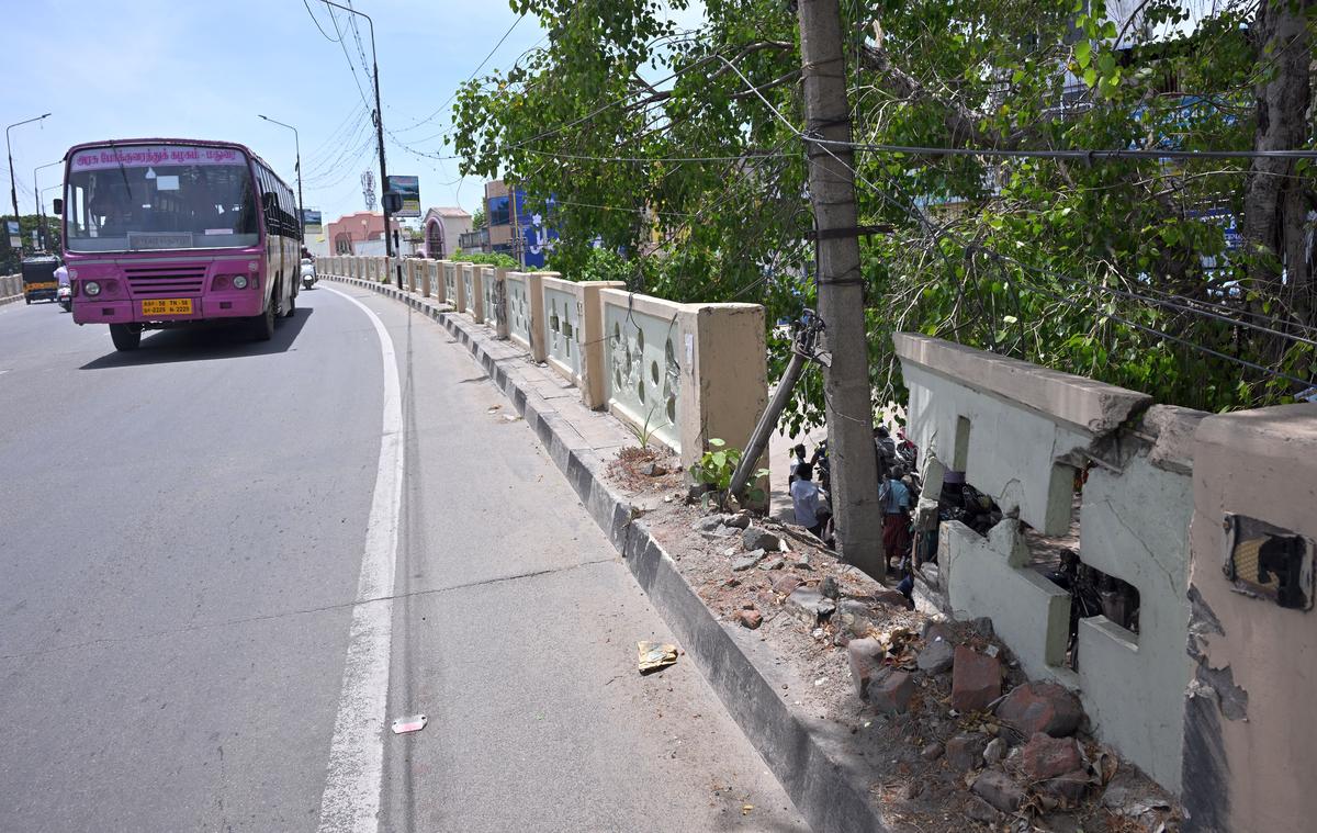 The damaged parapet wall of Mayor Muthu bridge on TPK road in Madurai.