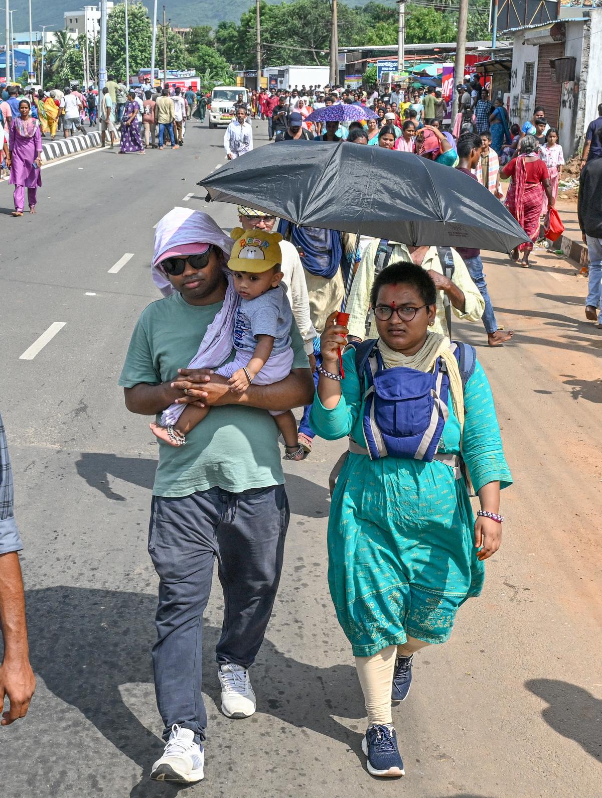 Braving the hot sun, a large number of devotees participating in the annual ‘Giri Pradakshina’ of Sri Varaha Lakshmi Narasimha Swamy of Simhachalam Temple in Visakhapatnam on Wednesday.
