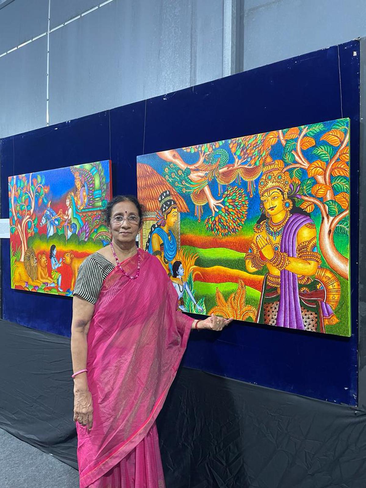 Ragini Krishnan with her paintings exhibited at Ganesham, Thycaud in Thiruvananthapuram